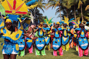 Revelers can enjoy music, food and nightly Junkanoo Rush parades at the high-energy celebration.